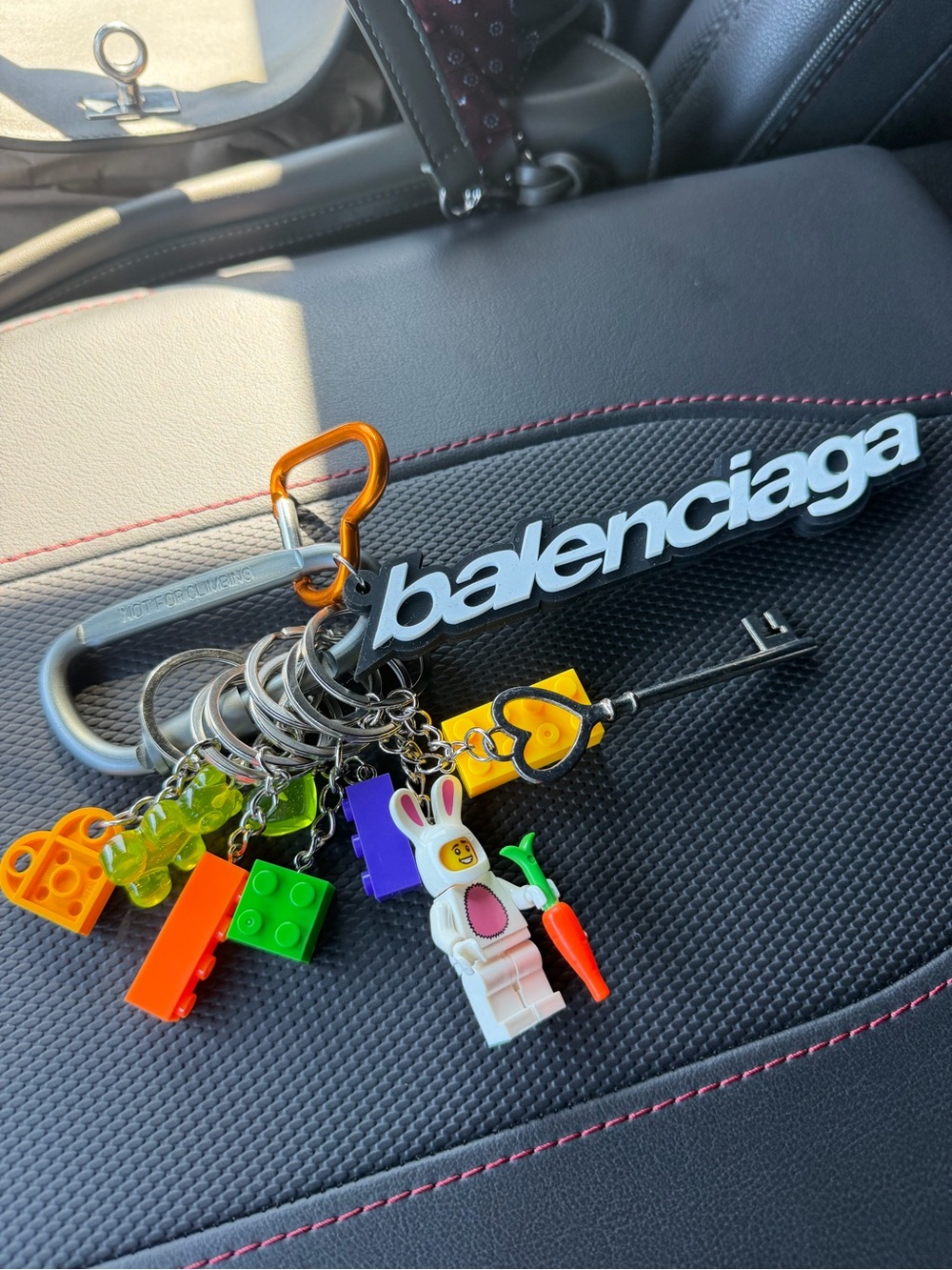 Black & White Logo Keychain with Multicolor Charms